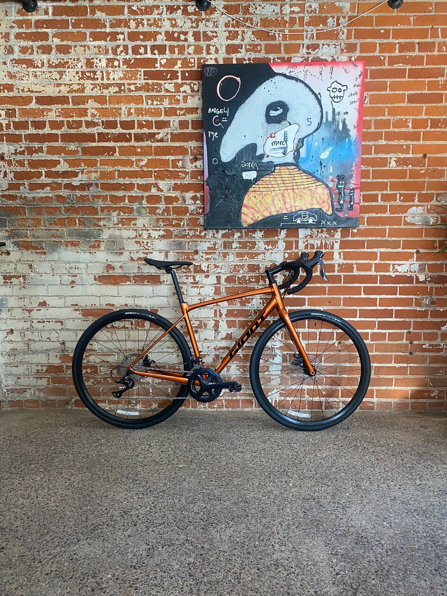 Giant Contend AR 3 ML Amber Glow SHIFT Cyclery Coffee Bar